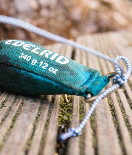 Wurfsack mit schwimmfähiger Rettungsleine für Strömungsrettung, Wasserrettung und schnelle Personenrettung auf Fließgewässern. Professionelle Sicherheitsausrüstung für DLRG, Feuerwehr und Wasserrettungsdienste.